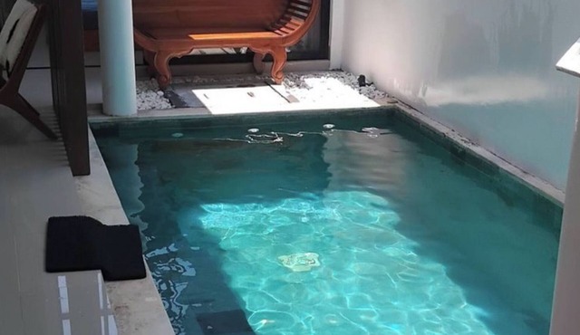 Serene Bali Villa with Private Pool and Antiqued Charm in Denpasar