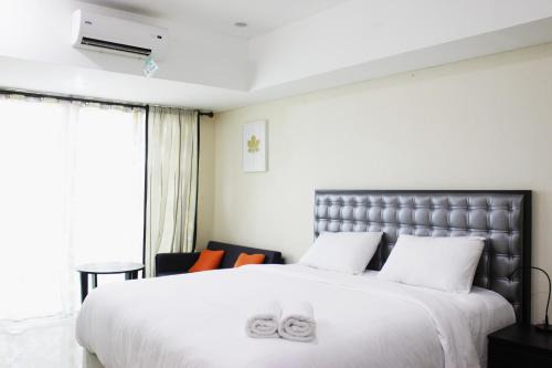 Strategic Studio Room Tamansari La Grande Apartment By Travelio in Bandung