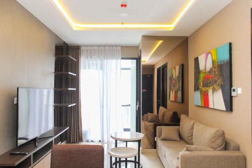 Stunning and Comfy 2BR + Study Room at Sudirman Suites Apartment By Travelio in Jakarta