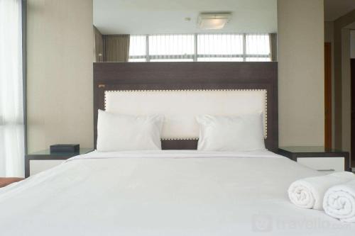 Vibrant Luxurious 2BR Apartment at Aryaduta Residence Connected to Cito Mall By Travelio in Surabaya