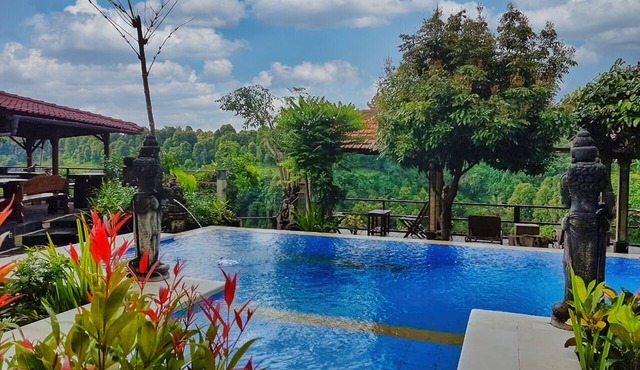 Villa Ayu offers stunning view over mountains green valley with waterfall in Bali