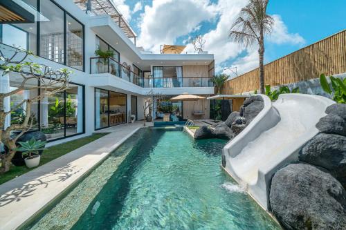 Villa Lumira - Breathtaking 4BR with Water Slide & Rice Field Views in Canggu