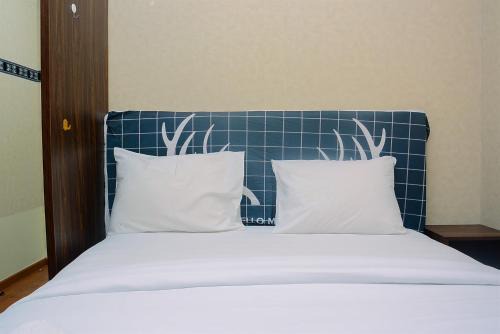 Beautiful 2BR with Direct Access to Pool Green Bay Pluit Apartment By Travelio in Jakarta