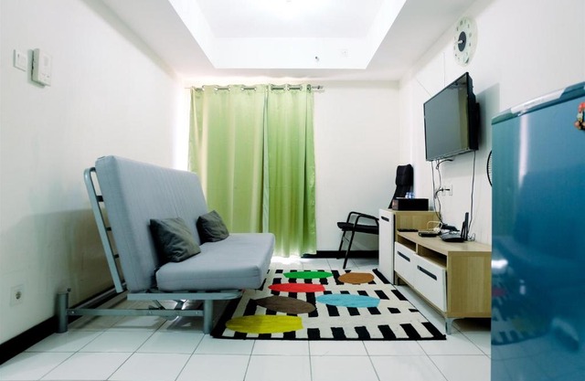 Minimalist 1BR with City View The Wave Apartment By Travelio in Jakarta