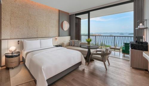 Deluxe Guest room, 1 King, Sofa bed, Ocean view, Balcony