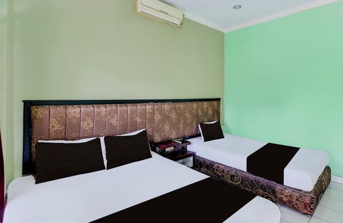 Cokroaminto Hotel | Collection O Bali near Terminal Ubung formerly Batukaru Garden Hotel