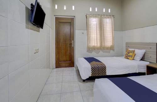 Muncar Hotel | OYO Life 90159 Puri Asoka Guest House