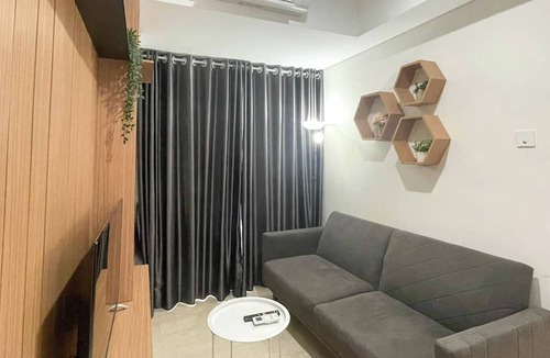 Kesawan Apartment | Wooden Accents 1Br At Podomoro City Deli Medan Apartment