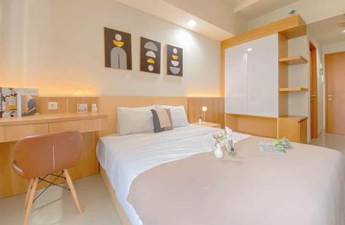 Depok Apartment | Cozy Living Studio at Evenciio Margonda Apartment