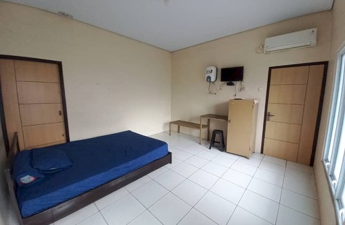 Sumber Hotel | OYO 94034 Perbetulan Guest House Syariah