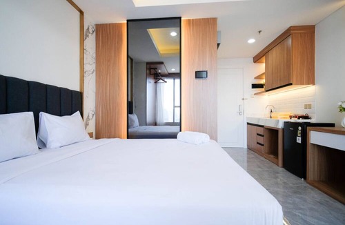 Suko Manunggal Apartment | New And Cozy Studio At 88 Avenue Apartment