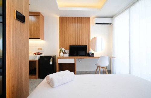 Suko Manunggal Apartment | New And Cozy Studio At 88 Avenue Apartment