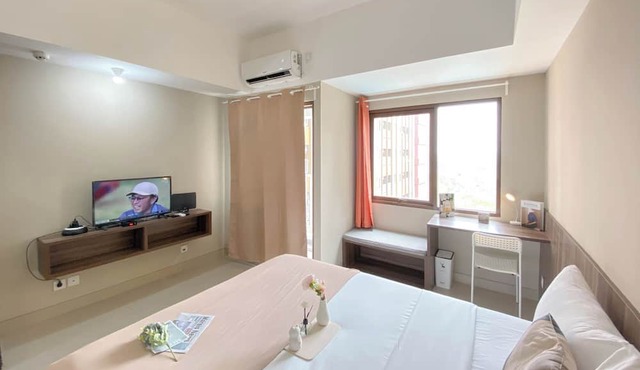 Cozy and Warm Studio at LRT City Jatibening Apartment in Bekasi