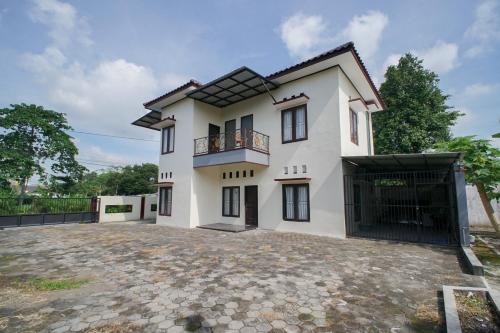 Grand Purwomartani Homestay Jogja in Salakan